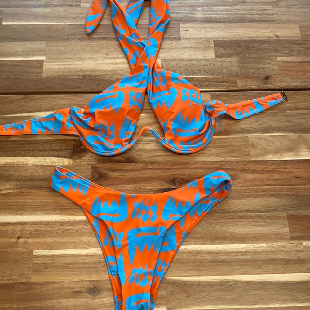 Bright bathing suit. Wire bra